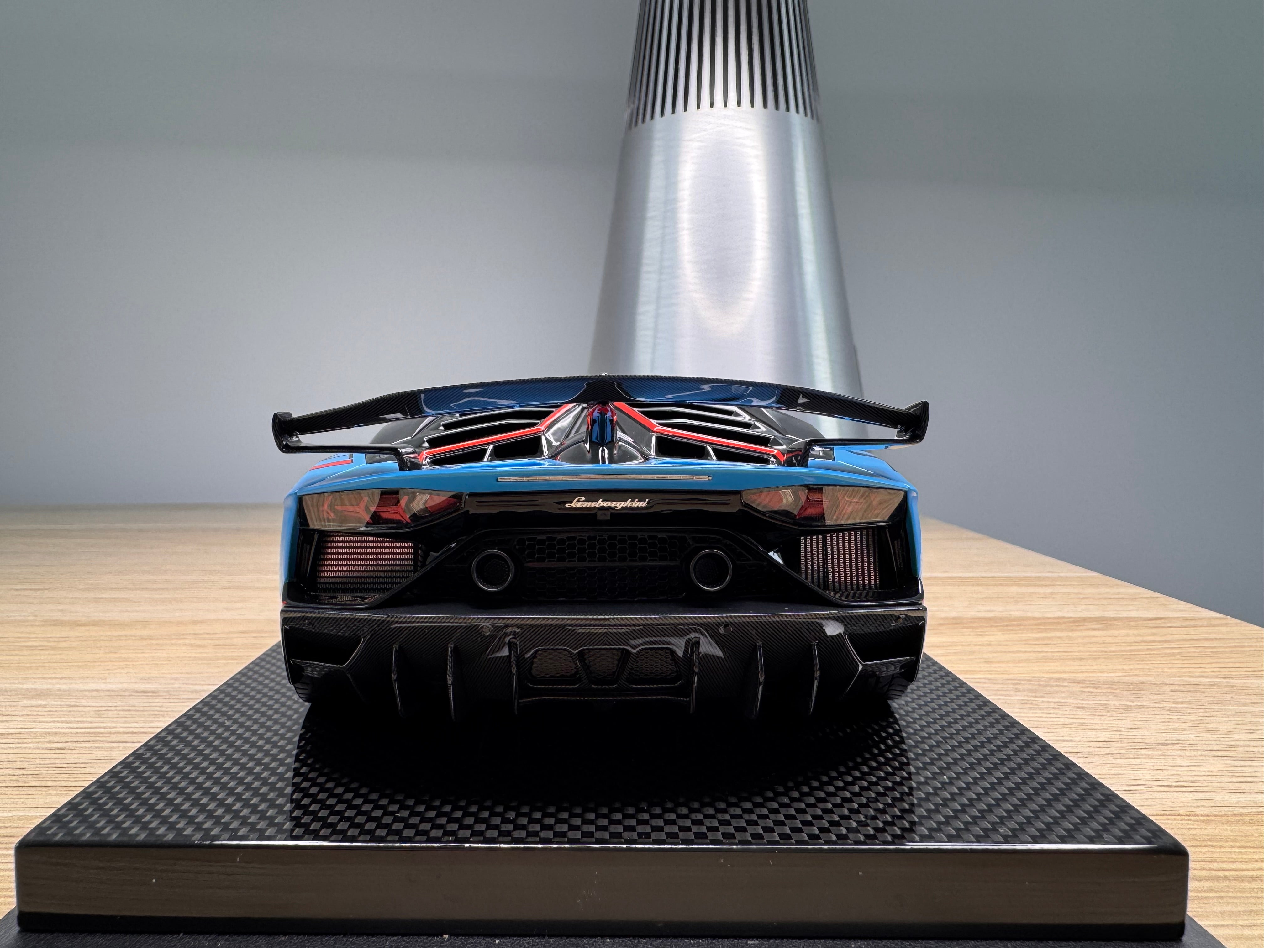Lamborghini Aventador SVJ - Azzurro Flake / Red Stripe - 1:18