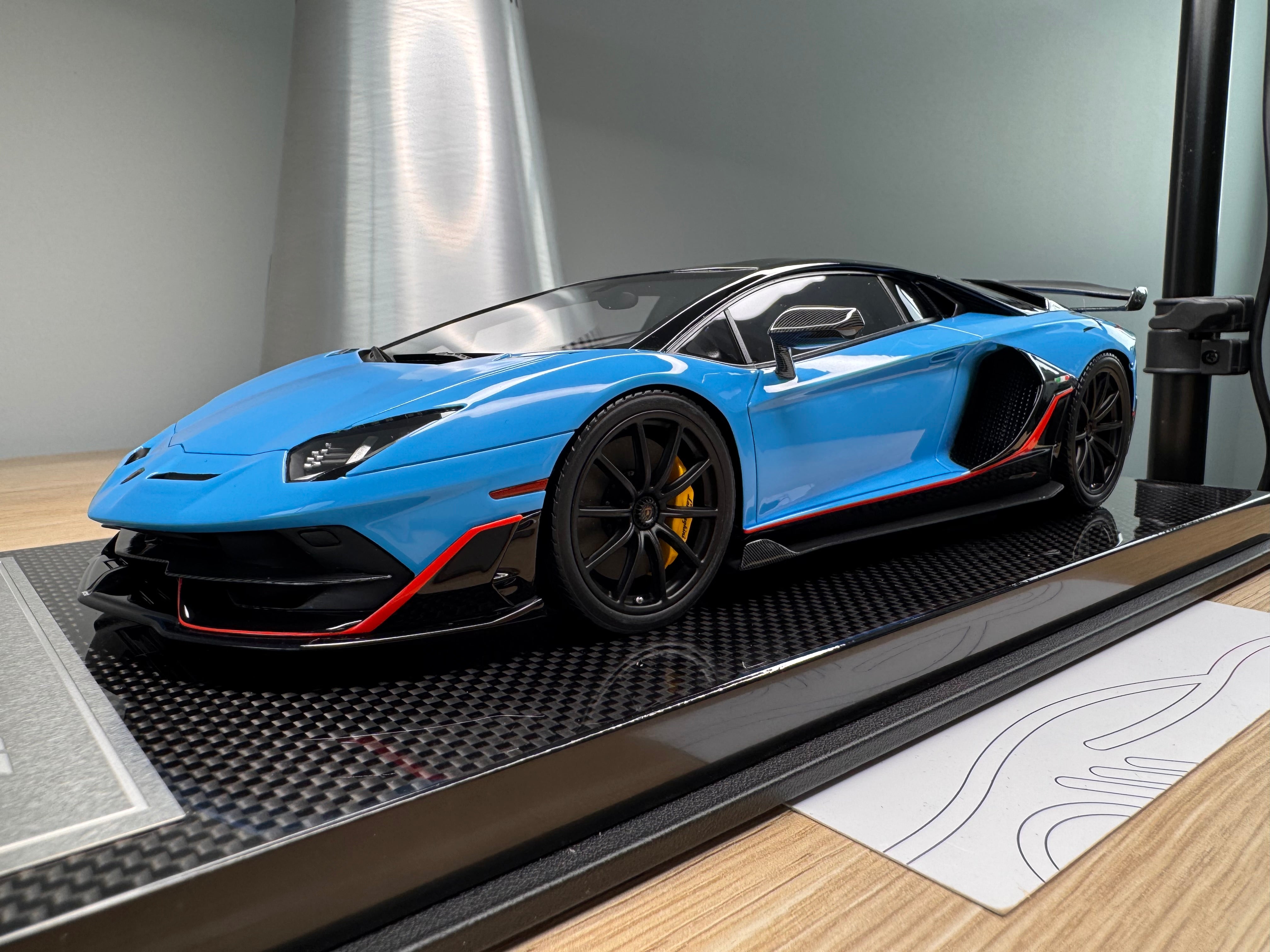Lamborghini Aventador SVJ - Azzurro Flake / Red Stripe - 1:18