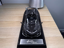 Load image into Gallery viewer, Pagani Huayra Roadster Tempesta - matte black / carbon - 1:18