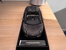 Load image into Gallery viewer, Lamborghini Aventador LP700-4 Roadster - Matte Black - 1:18
