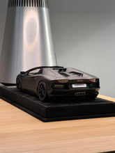 Load image into Gallery viewer, Lamborghini Aventador LP700-4 Roadster - Matte Black - 1:18
