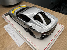 Load image into Gallery viewer, Ferrari F12tdf - metallic silver with yellow stripe - 1:18
