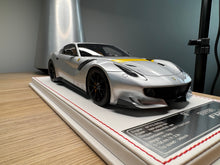 Load image into Gallery viewer, Ferrari F12tdf - metallic silver with yellow stripe - 1:18
