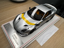 Load image into Gallery viewer, Ferrari F12tdf - metallic silver with yellow stripe - 1:18
