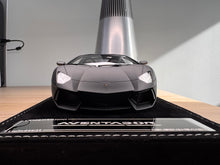 Load image into Gallery viewer, Lamborghini Aventador LP700-4 Roadster - Matte Black - 1:18
